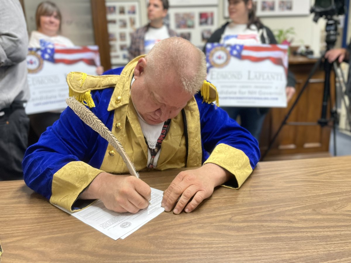 Edmond LaPlante, candidate for NH Governor. 

(That pen ran out, so he finished the paperwork with a TD Bank pen that was nearby.) #nhpolitics
