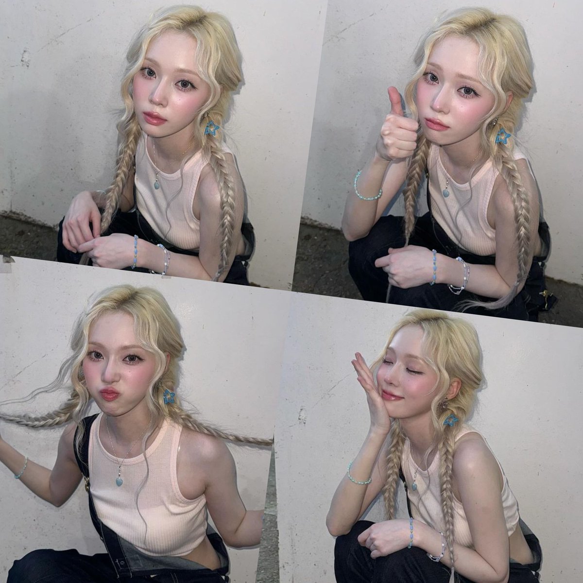 Radiating effortless beauty, she captures hearts with her serene expressions and playful poses. The delicate braids frame her face, adding to her enchanting presence. Each moment is a blend of grace and charm, making every snapshot a delightful memory.