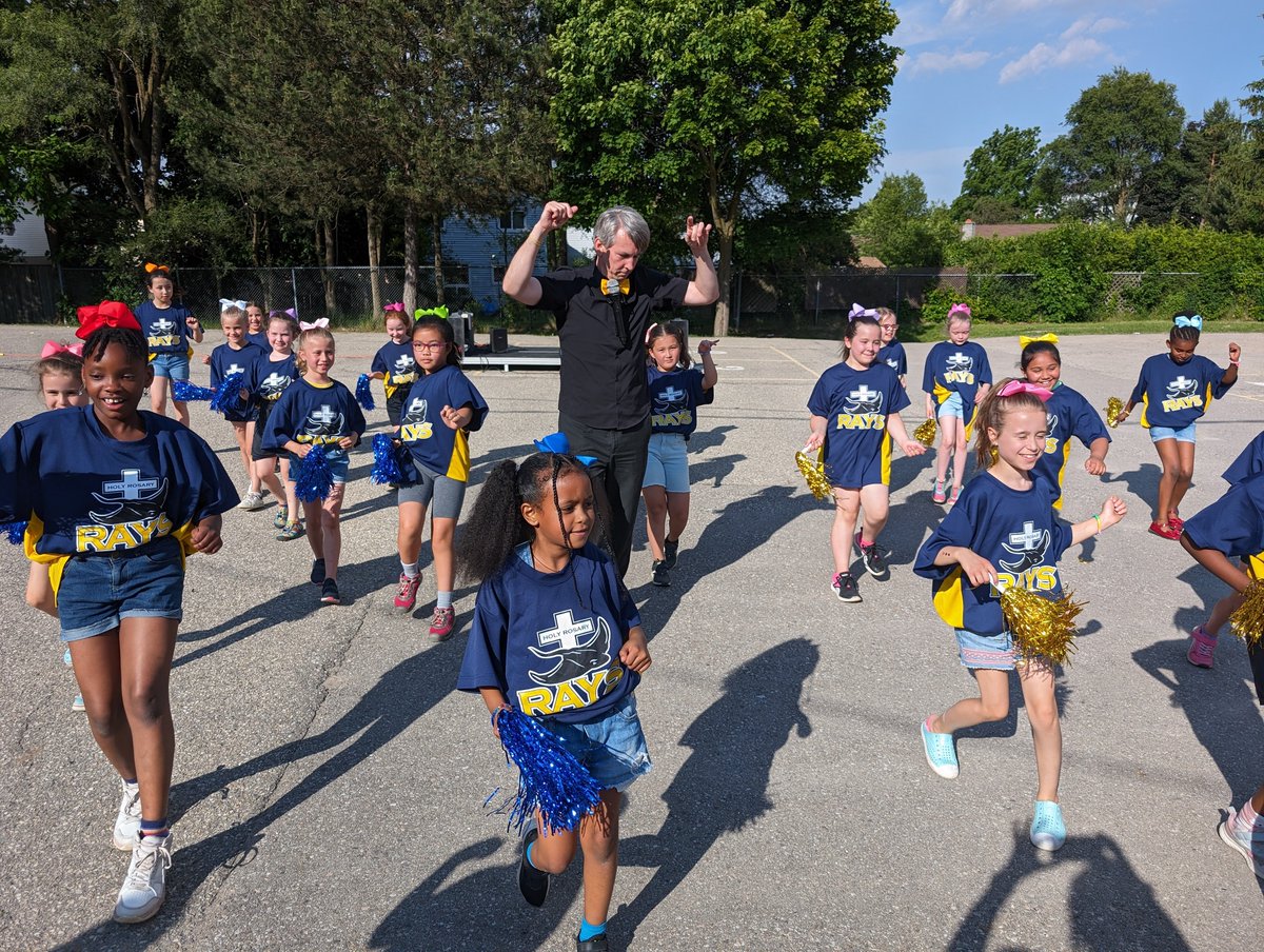 The <a href="/HRosaryWaterloo/">Holy Rosary Catholic School - Home of the Rays!</a> 📣GLEE team📣 brought the ENERGY at the year end Pizza Picnic! The team was proud to show off their hard work. The crowd (and even the magician) joined this continued dance party afterwards! GO RAYS! This wont be the last you see of GLEE!🌟🌟