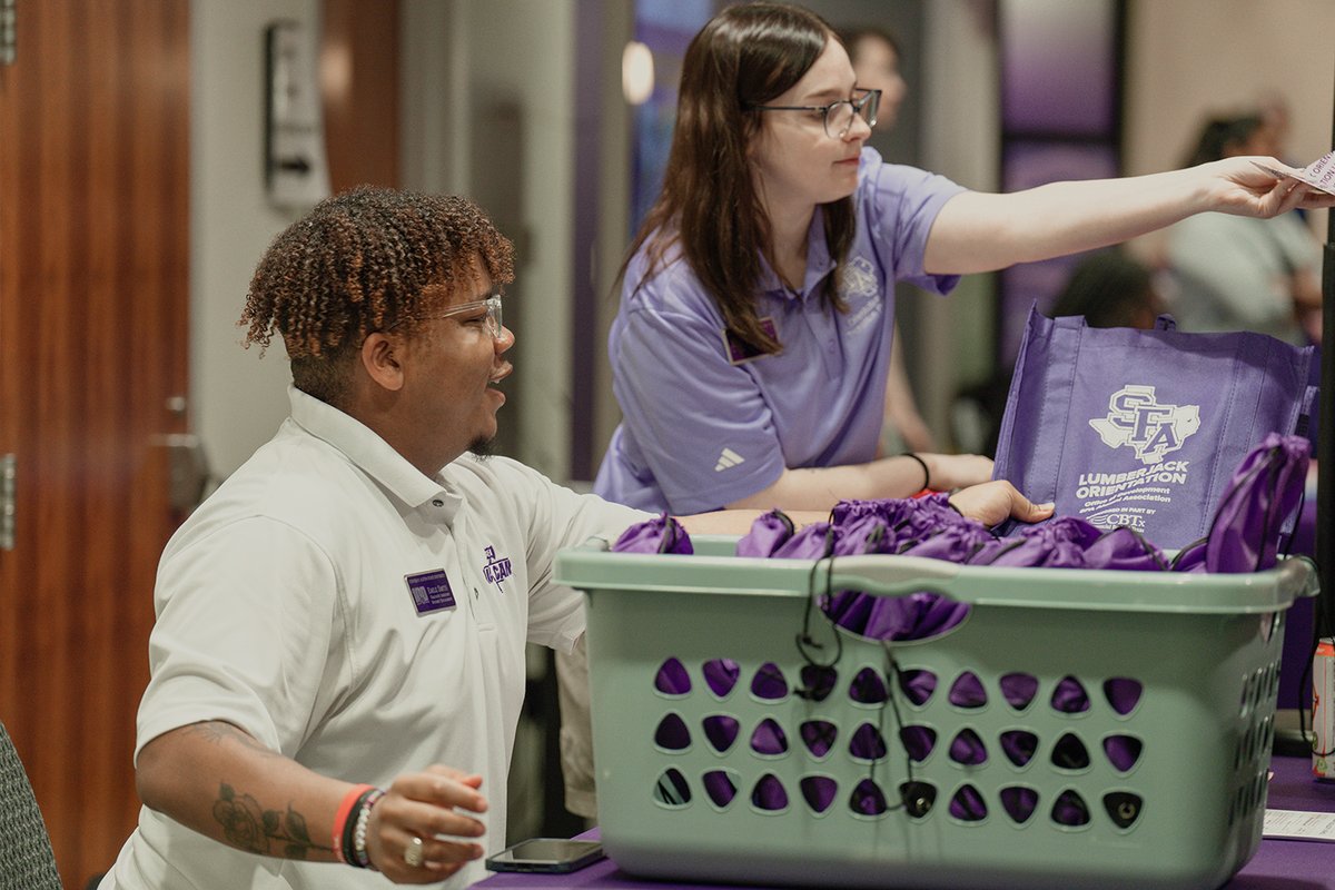 SFASU's tweet photo. #LumberjackOrientation is the perfect place to catch the SFA spirit! Check out these new mem'ries and tag us in your photos, #SFA28! 📸✨ #AxeEm 💜🤍🎉 https://t.co/P6oIKLTS9z