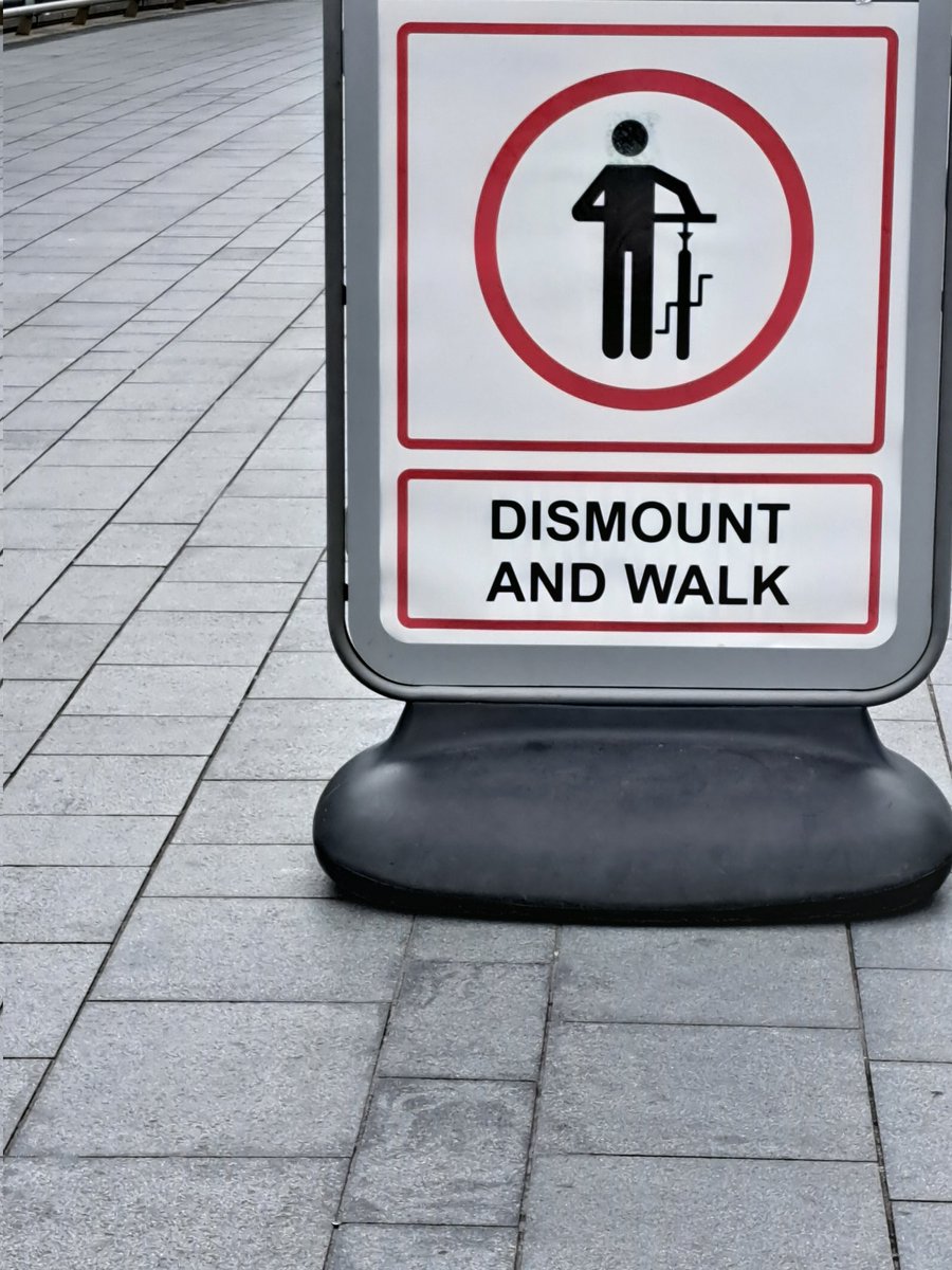 Nearly got hit from behind by a e-cyclist who appeared to be delivering for <a href="/JustEatUK/">Just Eat UK</a> on the bridge at <a href="/westfieldstrat/">Westfield Stratford City</a> despite these signs being there