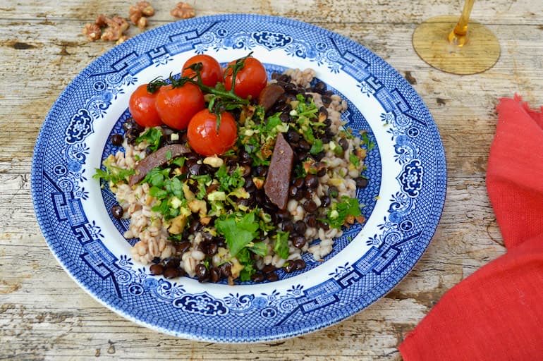 Choclette8's tweet image. This barley lentil dinner is a simple recipe made somewhat sophisticated by the addition of walnut gremolata and roasted tomatoes on the vine. It’s also very garlicky. If you love garlic as much as we do, this is a very fine thing. #simplesupper #veganuary tinandthyme.uk/2017/11/barley…