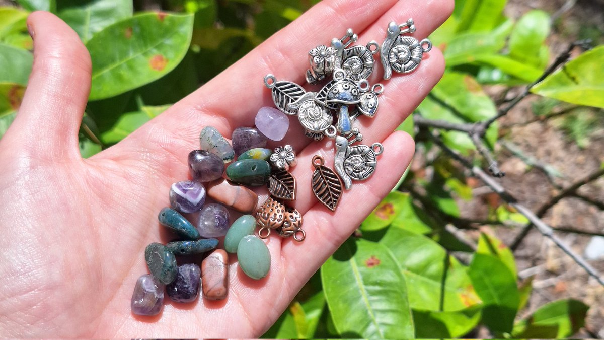 Sneak peak of the earrings I am going to make for my next shop update. I think the little snail charms are so cute!