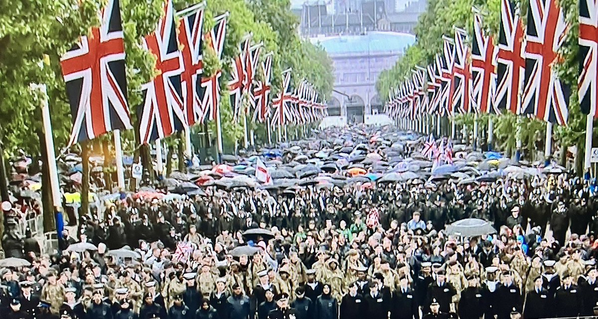 TheSusanGeorge's tweet photo. Our #country what we do brilliantly,our troops and all the practise to make #perfect an #inspiring sight - typical  #rainfall &amp; loyal #public with #colourful #unberellas before the #sun #shone for the #flypast and #redarrows #troupingofthecolour 2024 Happy Birthday King Charles https://t.co/Cvqf8Vq28X