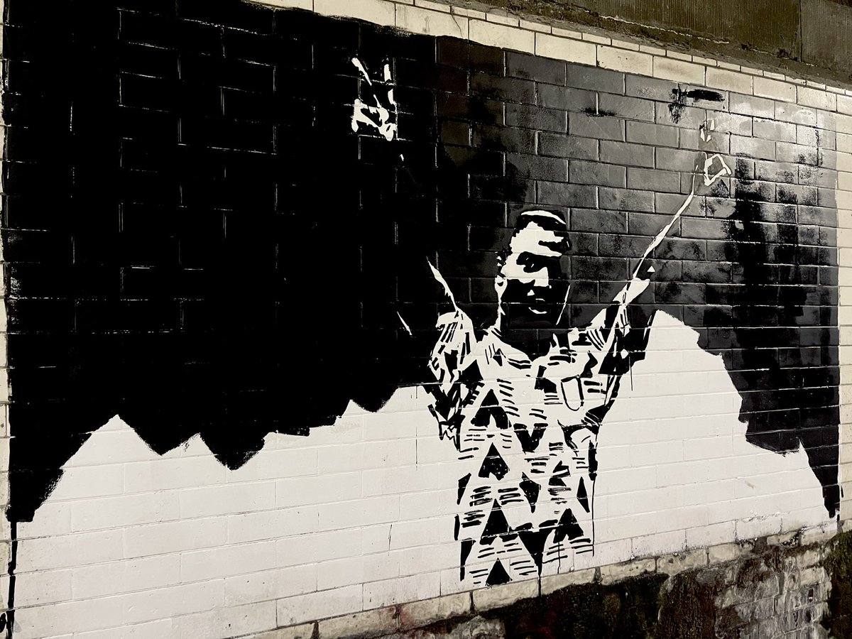 northbanksyafc's tweet photo. Kevin Campbell footballer and hero of @arsenal 1970-1924. Go With God, Our Brother  ♥️🤍 #Arsenal #StreetArt https://t.co/PfUMpHTsKO