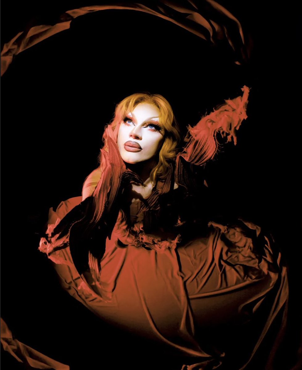 Drag_Crave's tweet photo. Lula Strega looks perfect in her ‘Flamme Olympique’ (Olympic Flame) runway for Drag Race France. https://t.co/b6VwnYRiLA