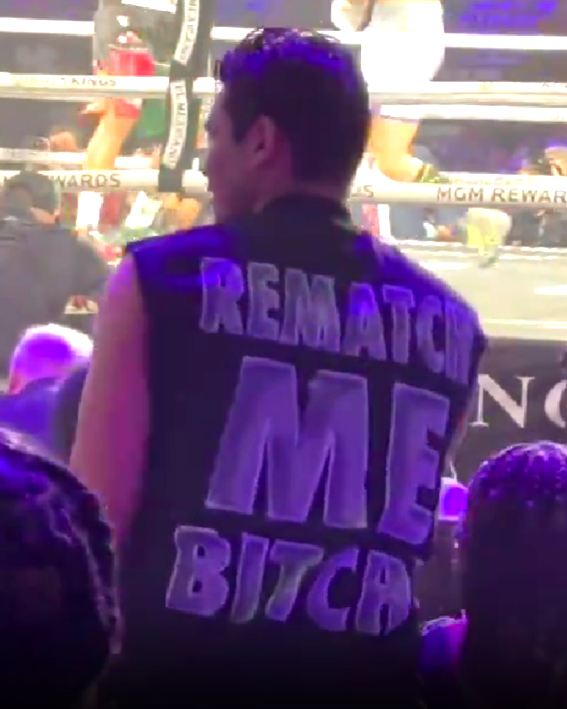 ringmagazine's tweet photo. Ryan Garcia has showed up to Gervonta Davis vs Frank Martin wearing a top that says 'Tank's #1 Fan' on the front and 'Rematch Me Bitch' on the back… https://t.co/NZU3J9DnKq