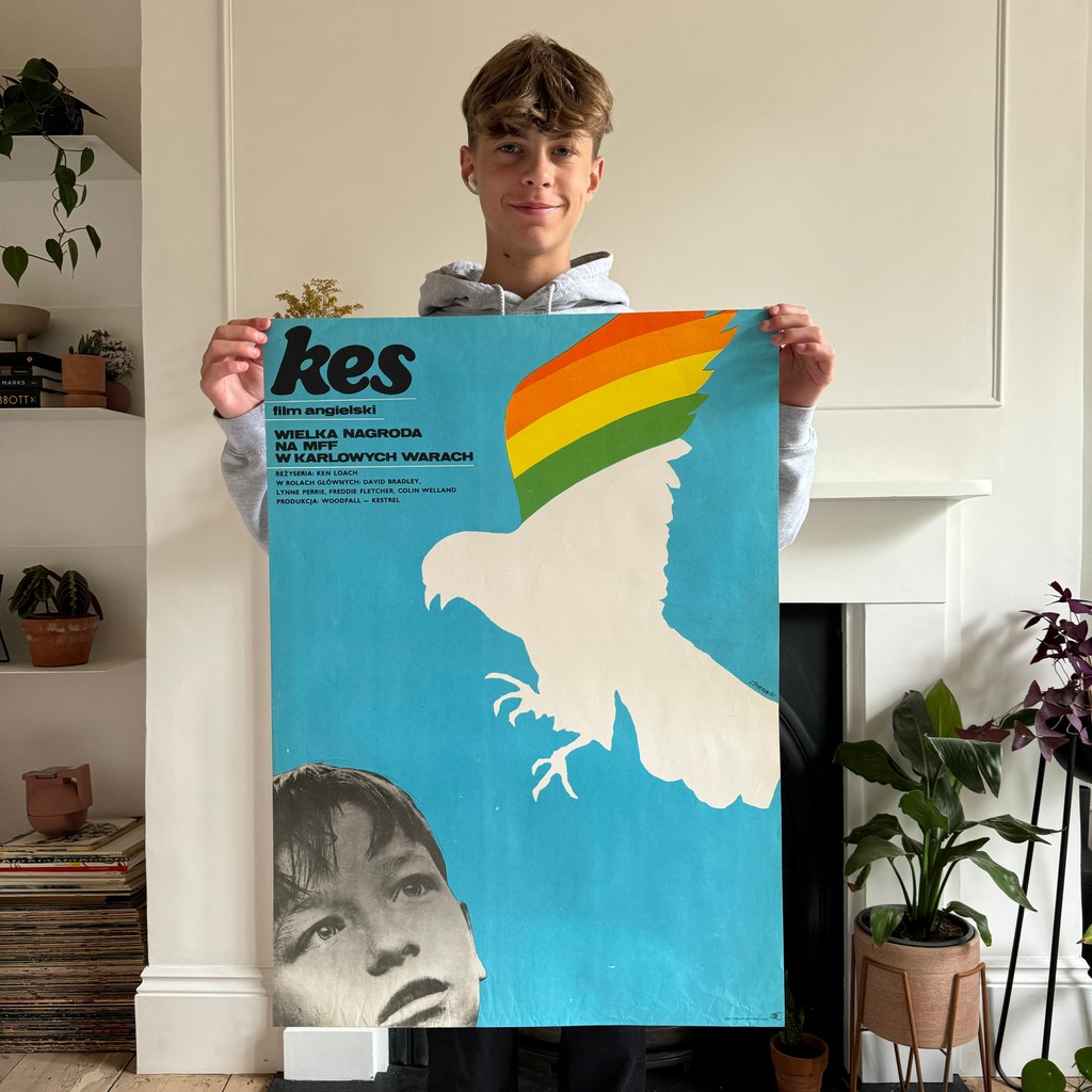 26Projekt's tweet photo. When you get your 13yr old kiddo (fluffy Alpaca) to pose for you but also to smileeee - that's obvs a sign of a good Sunday, right?! 
Josh is holding an iconic Polish poster designed by Zygmunt Bobrowski in 1973. https://t.co/0UBbQJbdNX