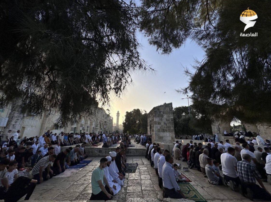 palestinians perform eid prayer at al aqsa mosque.