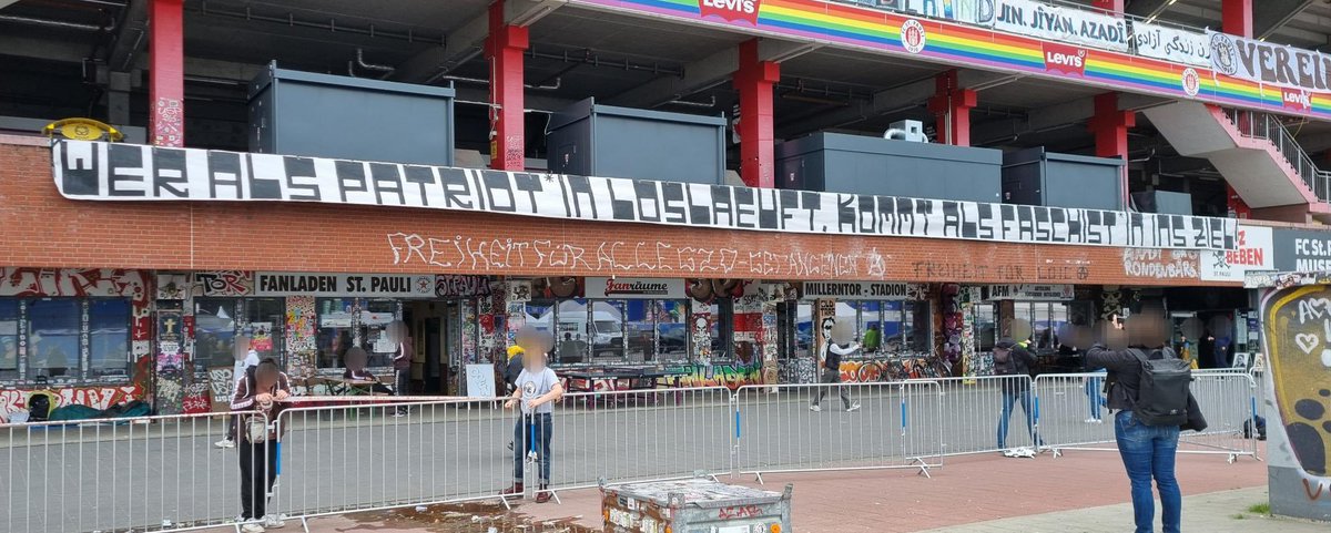 matt_4d's tweet photo. #Euro2024 arrives in Hamburg today, where the “fan zone” is outside FC St. Pauli’s Millerntor stadium. Banners placed by Ultrà Sankt Pauli:

“Love your club, not your fatherland”

“Those who start the race as patriots finish it as fascists.”

[via @UltraFCSP2002/@FasziFankurve] https://t.co/s9QrfLMwQa