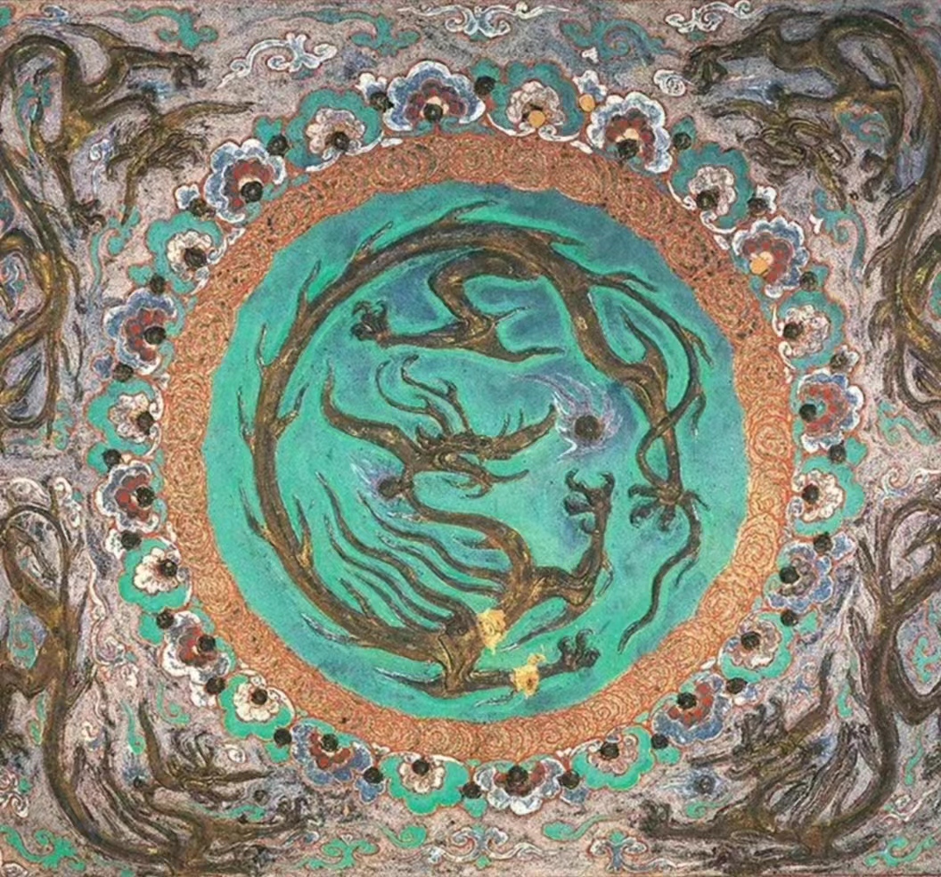 Ed1171918745's tweet photo. The pictures show a kind of flying dragon found in the murals of Mogao Caves, China. These two dragons have a long&amp;slender body, represented in elegant&amp;flowing posture. They seem to live in clouds in which colorful flowers bloom&amp;look like divine dancers descending from heaven. https://t.co/4U5d2VFSWs