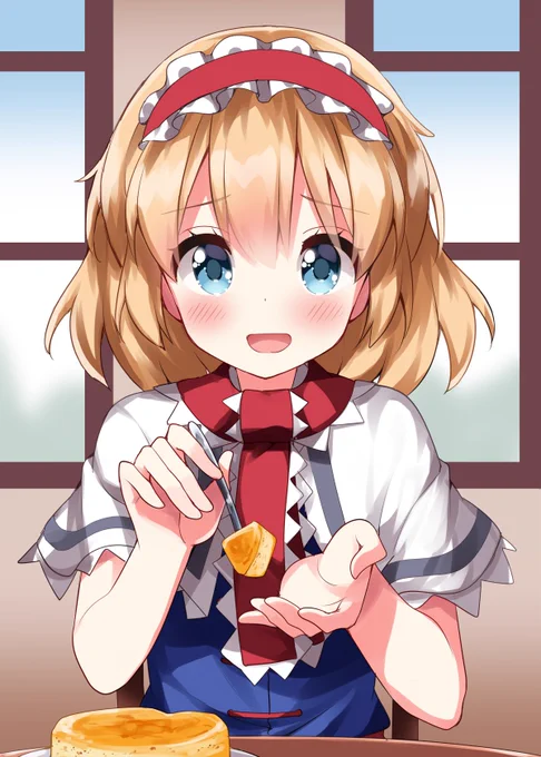 お菓子を食べさせてくれるアリス 