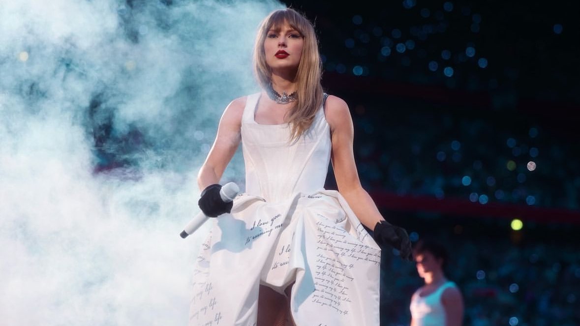 tswifterastour's tweet photo. “So many dreamy memories from Liverpool!! We played our 100th show on The Eras Tour (which feels truly deranged to say because this show feels new to me every time we play it. I want say thank you to our Eras Tour crew, my fellow performers and band who have now committed hundreds of hours to putting on this show and giving their all on and behind that stage. I can't believe the work ethic, creativity and dedication I get to be surrounded with every day. All 3 Liverpool crowds were so expressive and generous and endlessly FUN. Thank you to everyone who came out this weekend (you broke the all-time stadium attendance record!!) AND thank you to evervone who has come to any of the shows on The Eras Tour. It's been the adventure of a lifetime because of you. 🤍” -Taylor Swift (2024)