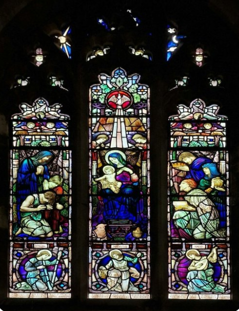 #StainedGlassSunday One of several superb vibrant windows in St. Nicolas, Taplow designed 1912-15 by Arild Rosencrantz &amp; made up by Lowndes &amp; Drury. Lots of charming details, the benevolent sheep at the feet of the Virgin, &amp; angels with musical instruments in the predella panels.