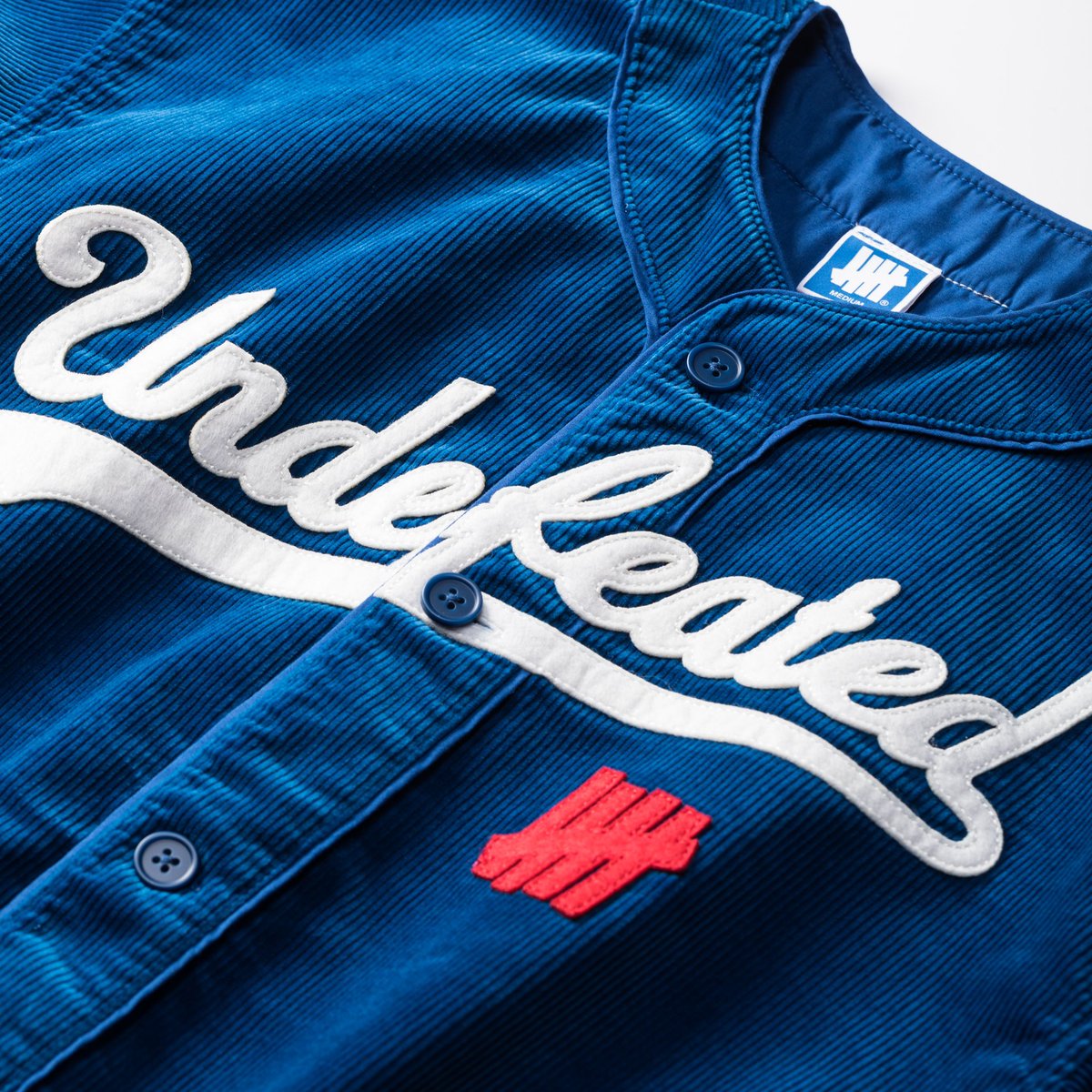 トップス UNDEFEATED CORD S/S BASEBALL JERSEY apparel_tops_undefeated_cord-