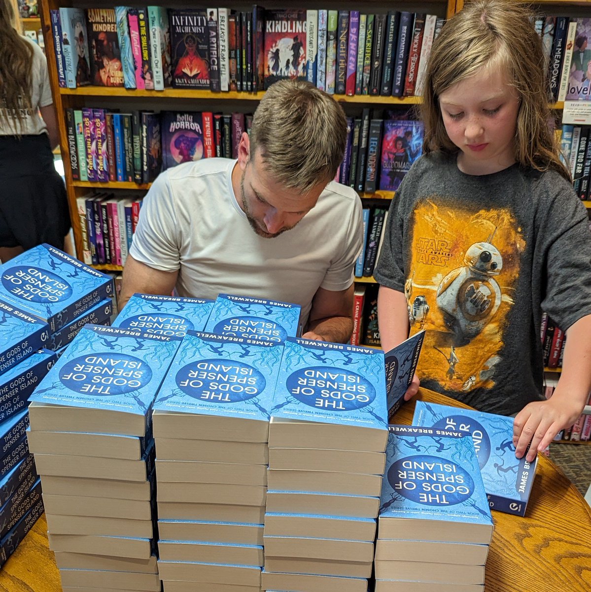 XplodingUnicorn's tweet image. Today was one of my favorite traditions: Signing copies of a new book. This year, my kids helped. Not with signing, but with opening the books to the right page (although their handwriting is probably better than mine.) These copies will be going in the mail tomorrow. Order now!