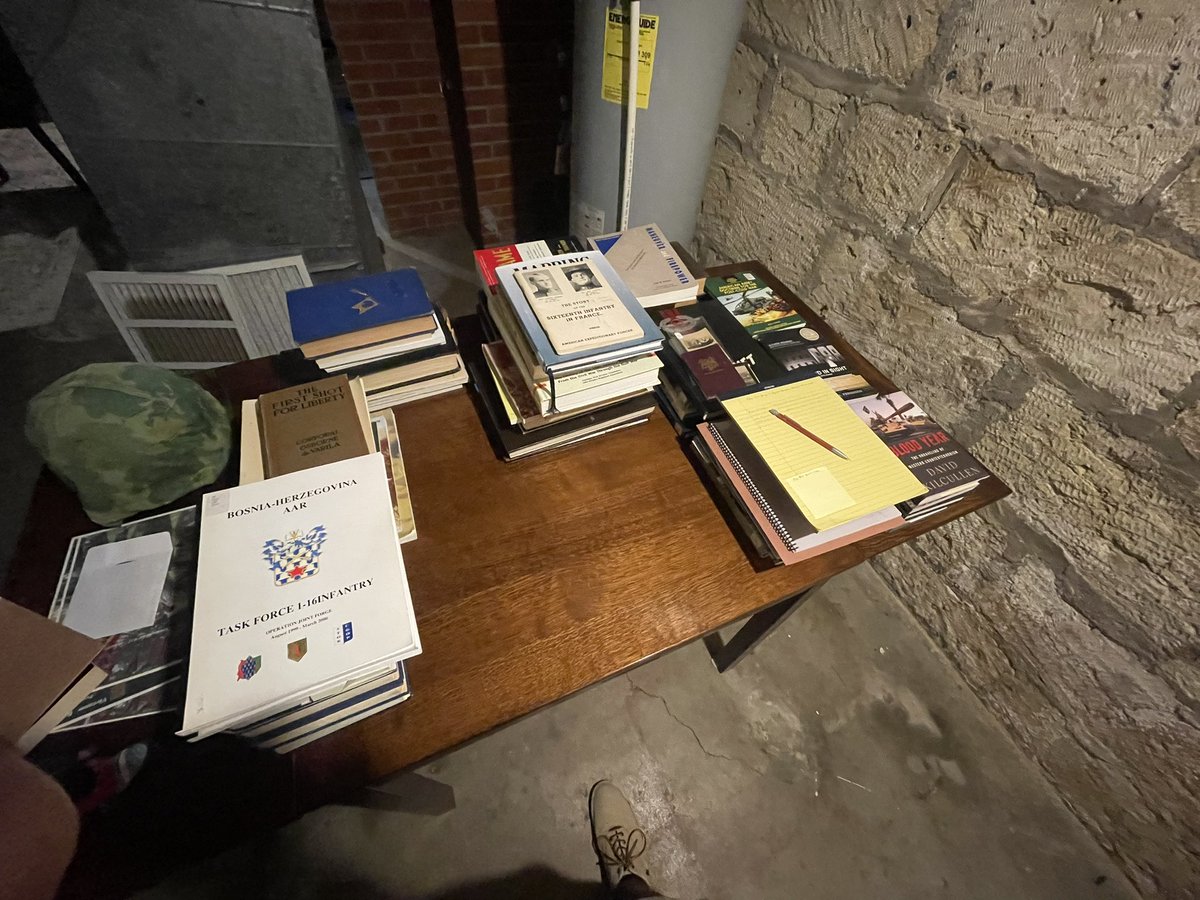 Chaos Management: Using a Dining Room Table in the Basement as Overflow for 50+ Books and a Work Space