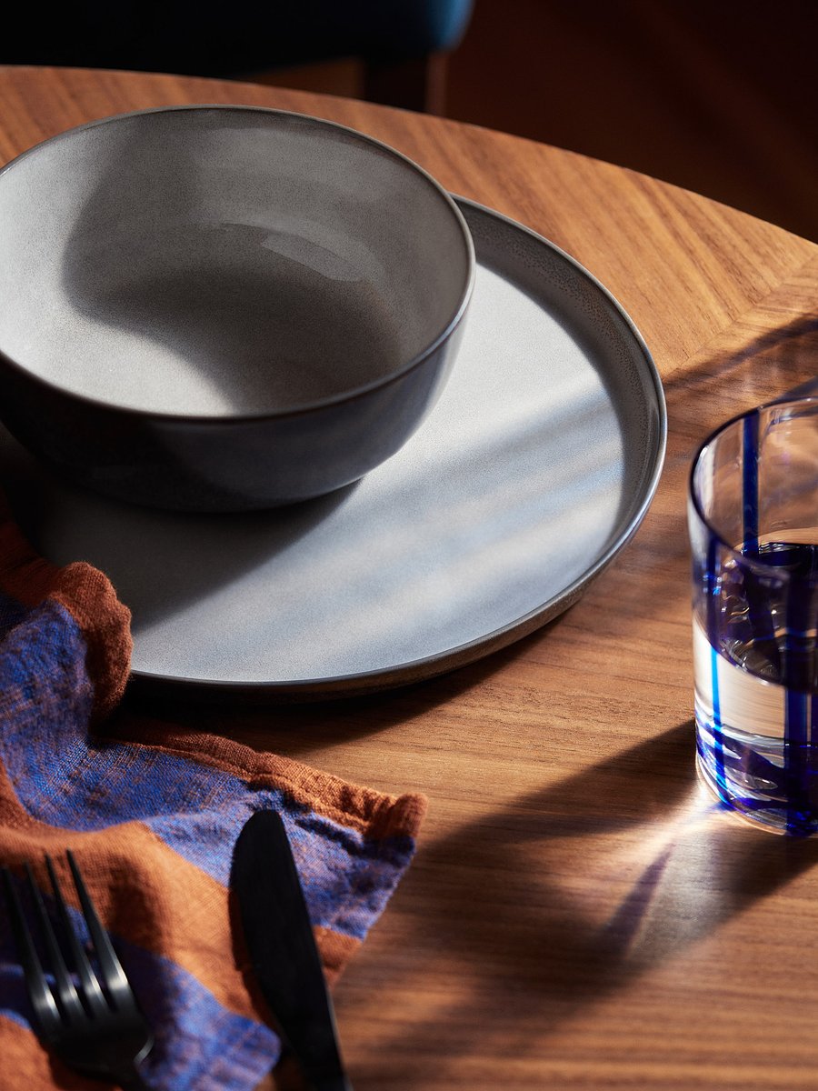 Refractions through water with <a href="/JohnLewisRetail/">John Lewis & Partners</a>. Glassware and water with subtle mottled light shot against textured fabrics and wood. AD Karin Brink. #stilllife