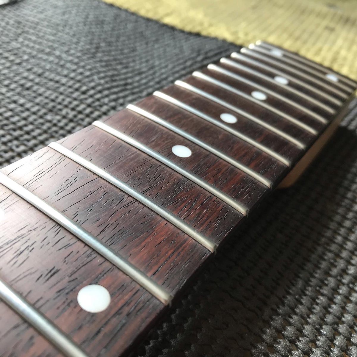 ABGuitartech's tweet photo. Dressing frets & stuff … #guitartech #guitartechnician #guitarrepair #guitarrepairs #fretdress #fretdressing #abguitartech #frets https://t.co/1WNHLnAAmh