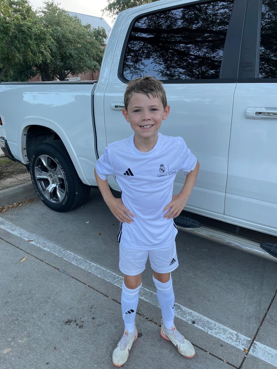 First day of his Madrid football camp, happy boy