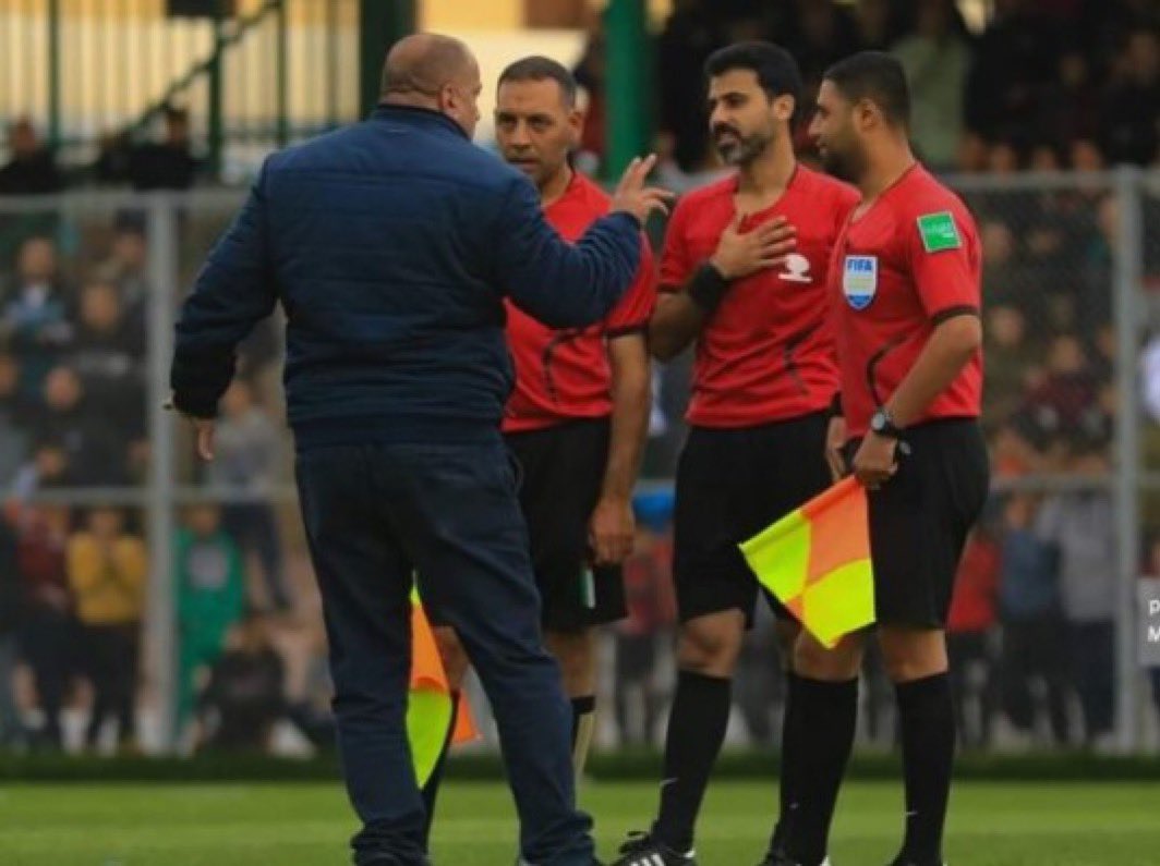 leylahamed's tweet photo. Here is a photo of both FIFA referee Hani Mesmeh (middle) and FIFA assistant referee Mohammed Khattab (on the right) working together.

Both of them have been murdered by Israel. https://t.co/vV8hTpMzds