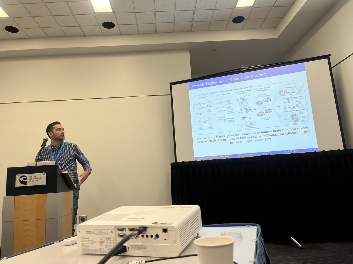 TopoNets's tweet photo. @Enri_amico introducing recent work on topological  instantaneous descriptions of brain tasks,  individual fingerprinting and behaviour. @NetSciConf #netsci2024 https://t.co/gZT7UFkLzA