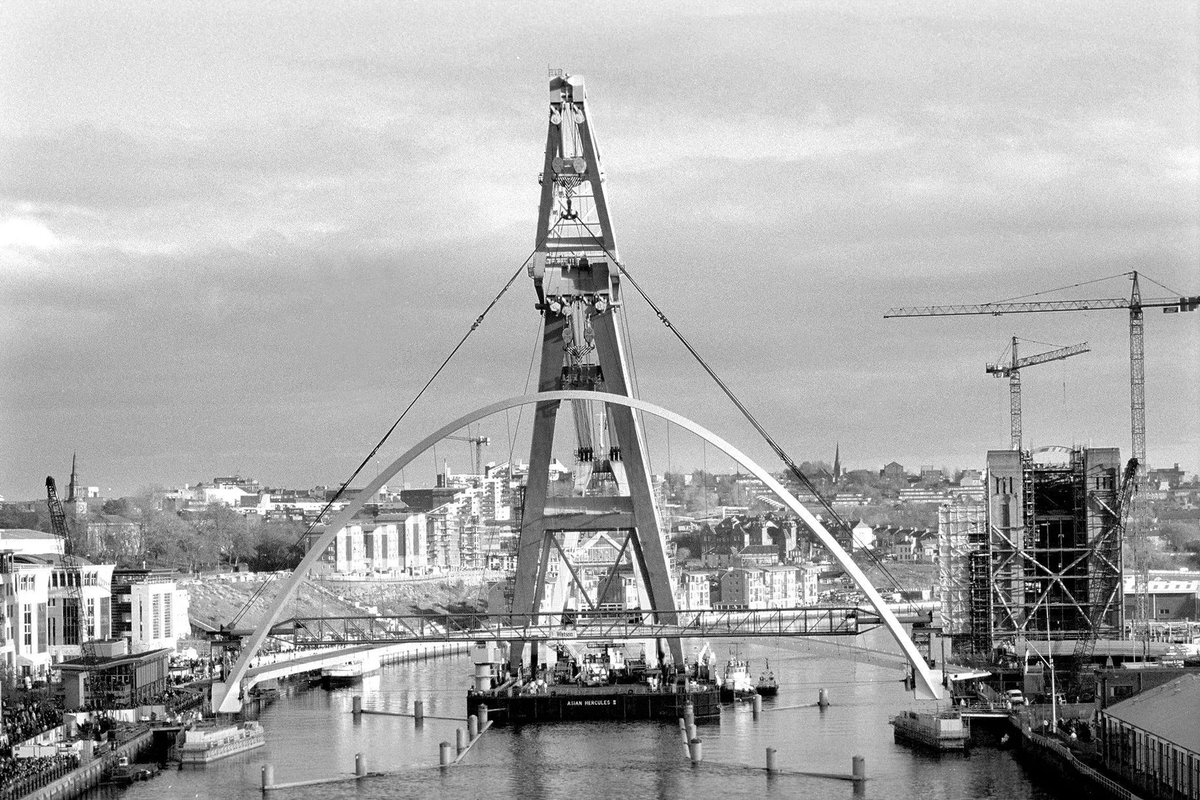 The giant floating crane Asian Hercules II setting the Gateshead Millennium Bridge in place, November 20th 2000.

Picture courtesy of Newcastle Chronicle.