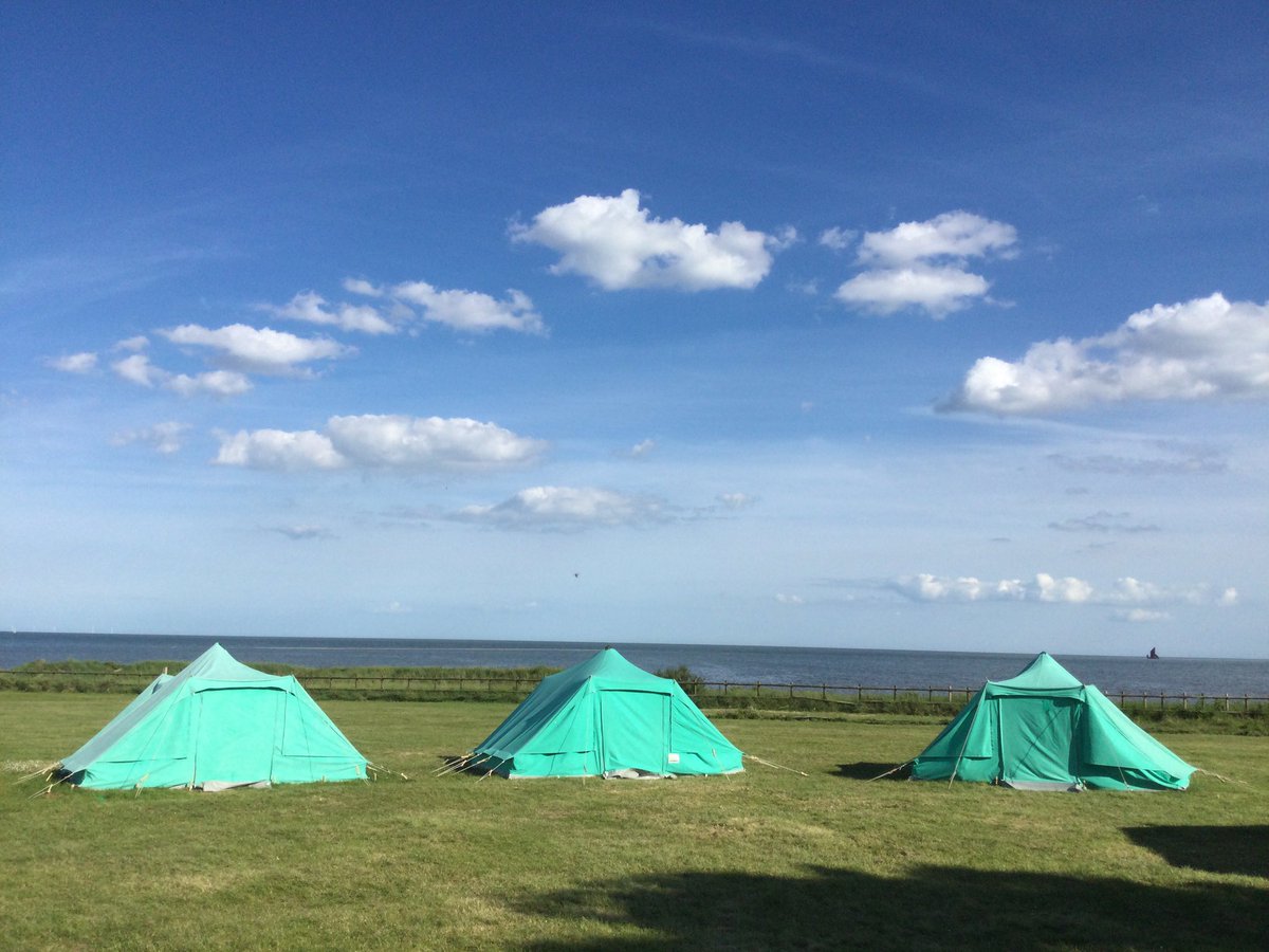 Beautiful sunshine here on Mersea Island. Everyone has settled into their tents by the sea.