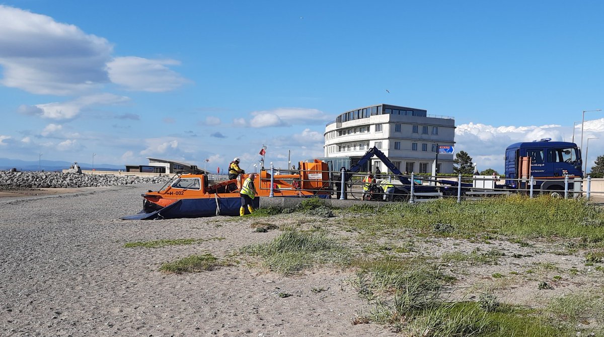Live from Morecambe Prom. Looks like somebody out on the sands needs medical help. The tides on its way in too. #RNLIMorecambe swiftly jump to action.