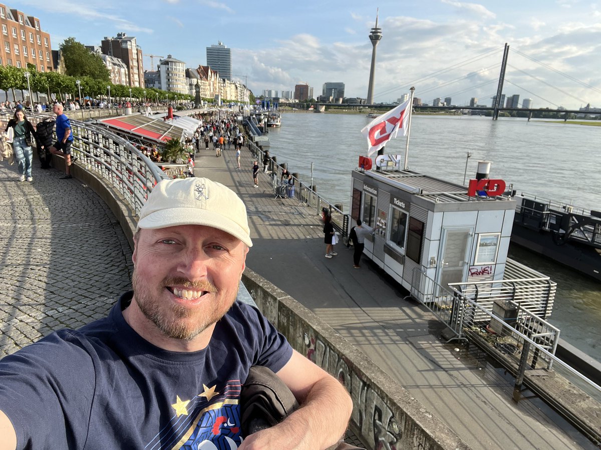 Promenading along my namesake in Düsseldorf. Everyone who’s not at tonight’s #EURO2024 match at the local stadium is down here by the river, going nuts.