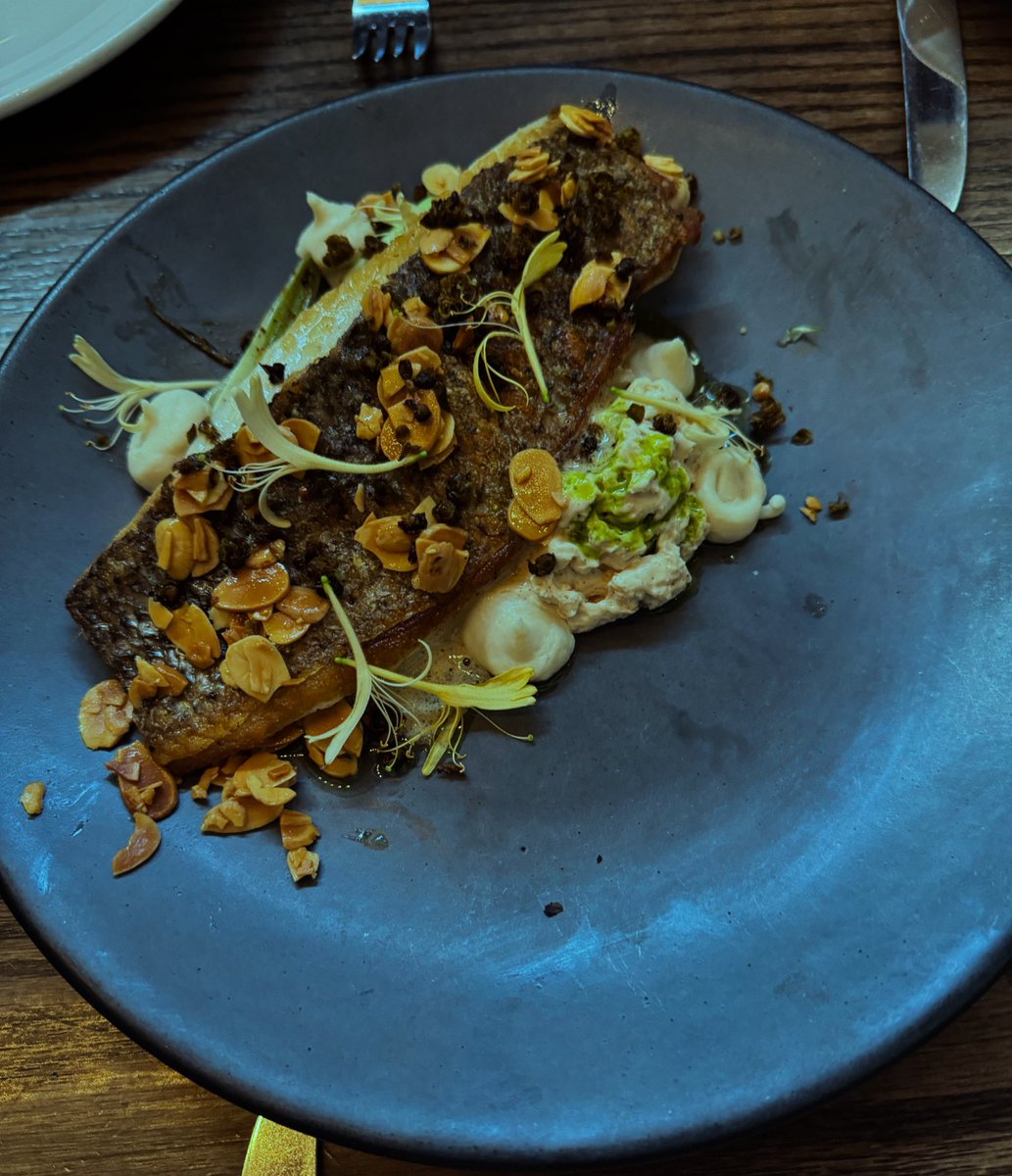 Alamosa Striped Bass • baby leeks • brown butter • capers • almonds • spring onion • green garlic 🤤 

#blackbellyco 
#delish 
#yum 
#stripedbass 
#coloradobass