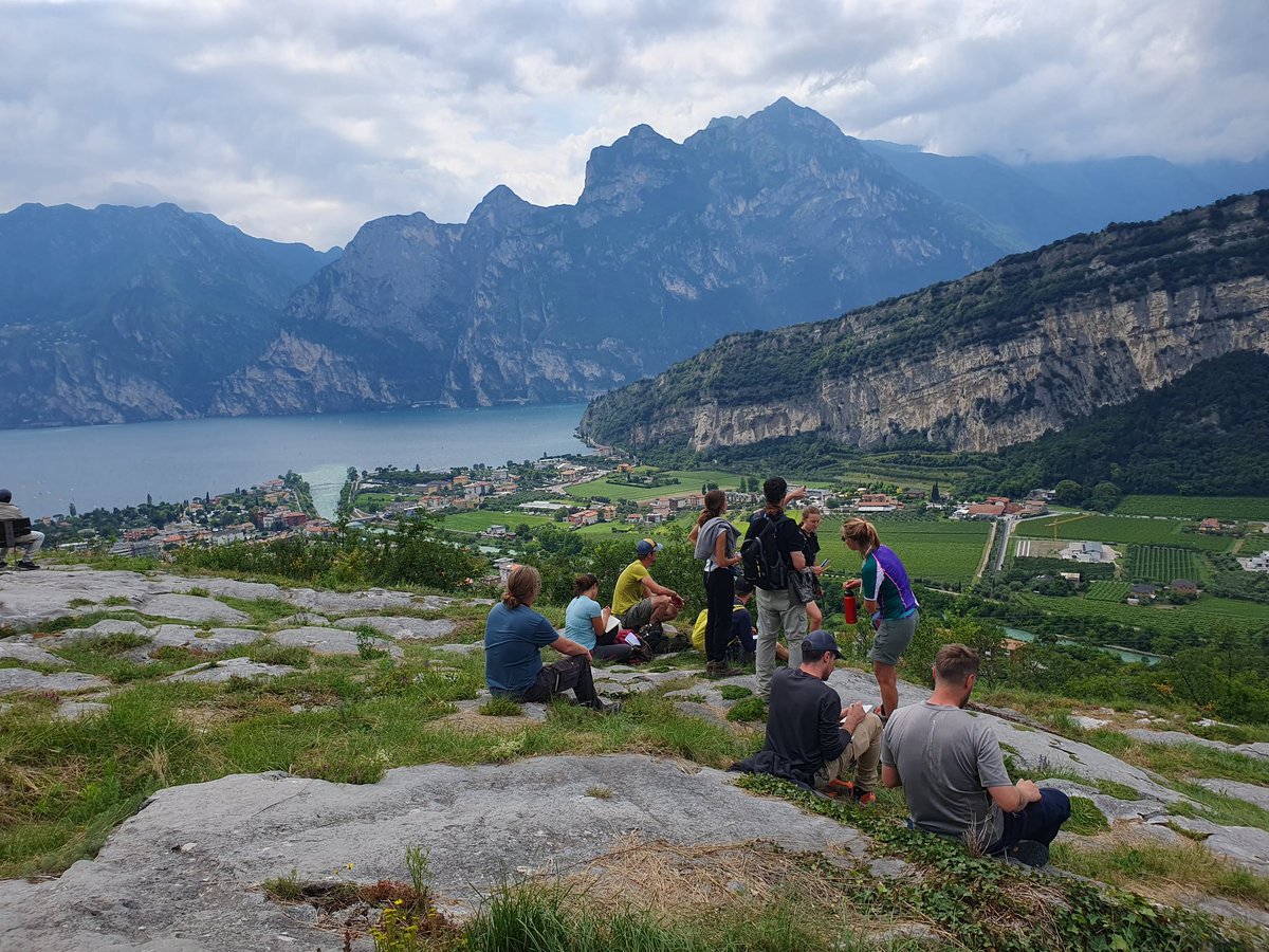 HPomella's tweet photo. The Southalpine stratigraphic succession: from the Permian in @Bletterbach Canyon to the Cenozoic on the northern shore of #LakeGarda. Spectacular excursion with our great Master students. @uniinnsbruck #Geology https://t.co/7O9JcDuQhO