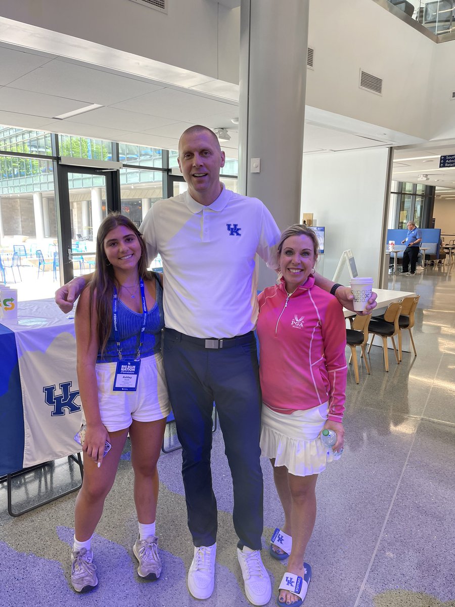 Freshman orientation at University of Kentucky. Coach Pope in student center talking with incoming freshman