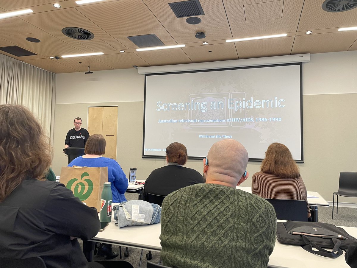 Now <a href="/willjb_29/">Will (He/they)</a> talking about Australian representations of HIV/AIDS on TV. Go Will! #ArtsMResRF2