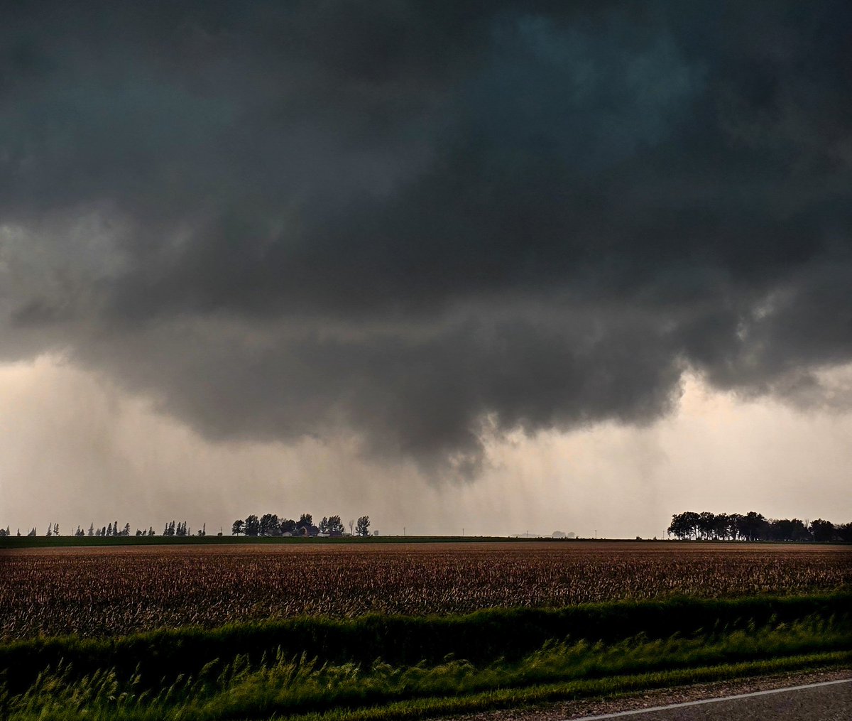 A rotating wall cloud with a needle funnel in the middle. Today near Greenville, Iowa. 6/17/24. 

This storm over-performed! A nice chase on my way back home after being stuck in Norfolk, NE for a couple days.

#iawx <a href="/GirlsWhoChase/">Girls Who Chase</a>