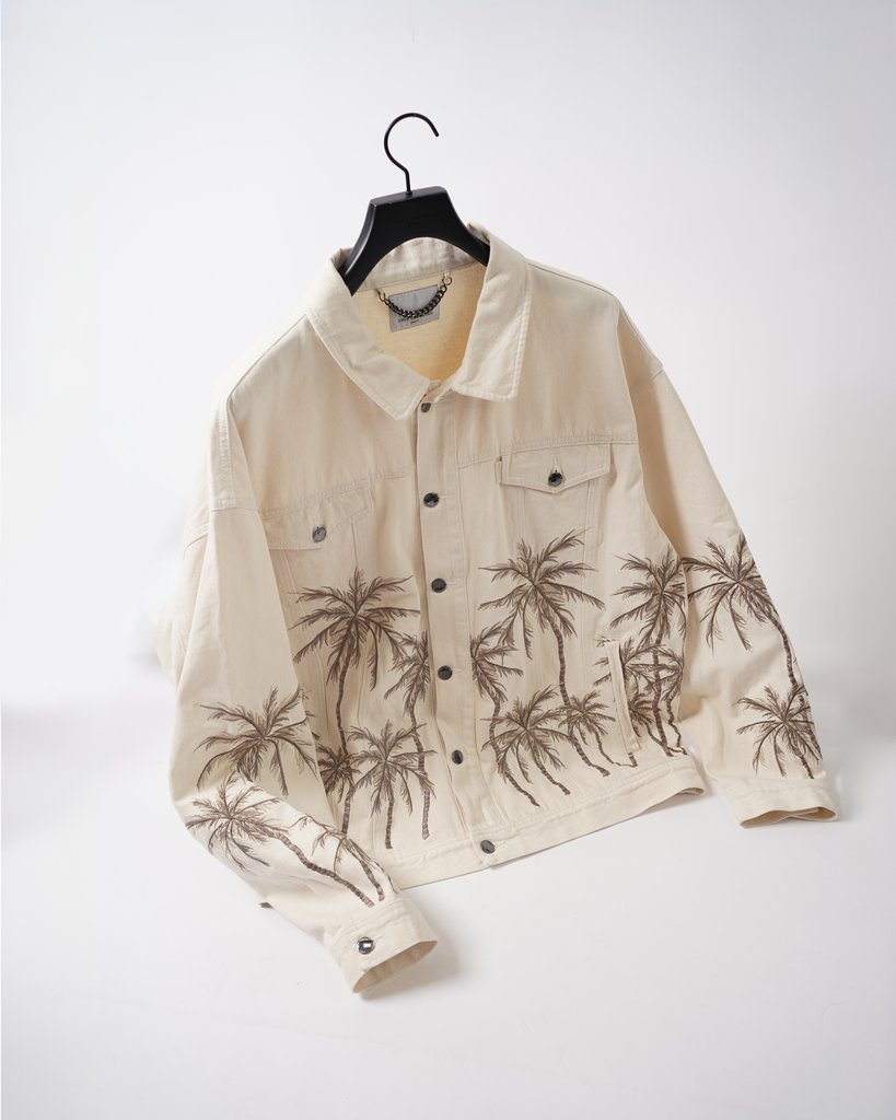 OnlyTheBlind's tweet photo. The Beige Palm Denim Jacket. Meticulously designed, this piece redefines the boundaries of casual sophistication. Crafted from premium beige washed heavyweight denim, offering durability and comfort 🌴 #summerfashion #streetwear #streetstyle https://t.co/sMVUXnO0cl