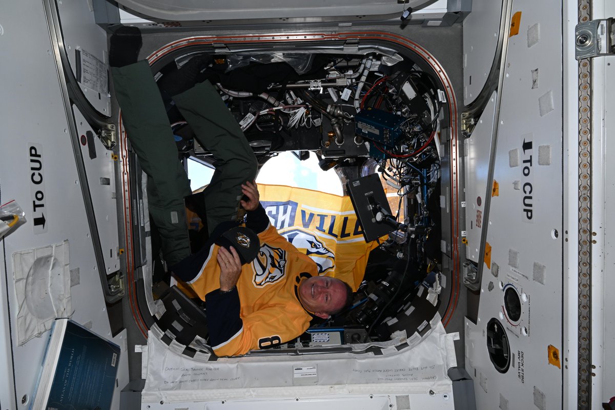 PredsNHL's tweet photo. Smashville in space 🚀 

NASA Astronaut Barry Wilmore is showing his #Preds pride while serving his third mission aboard the International Space Station! https://t.co/un9oz2daTY
