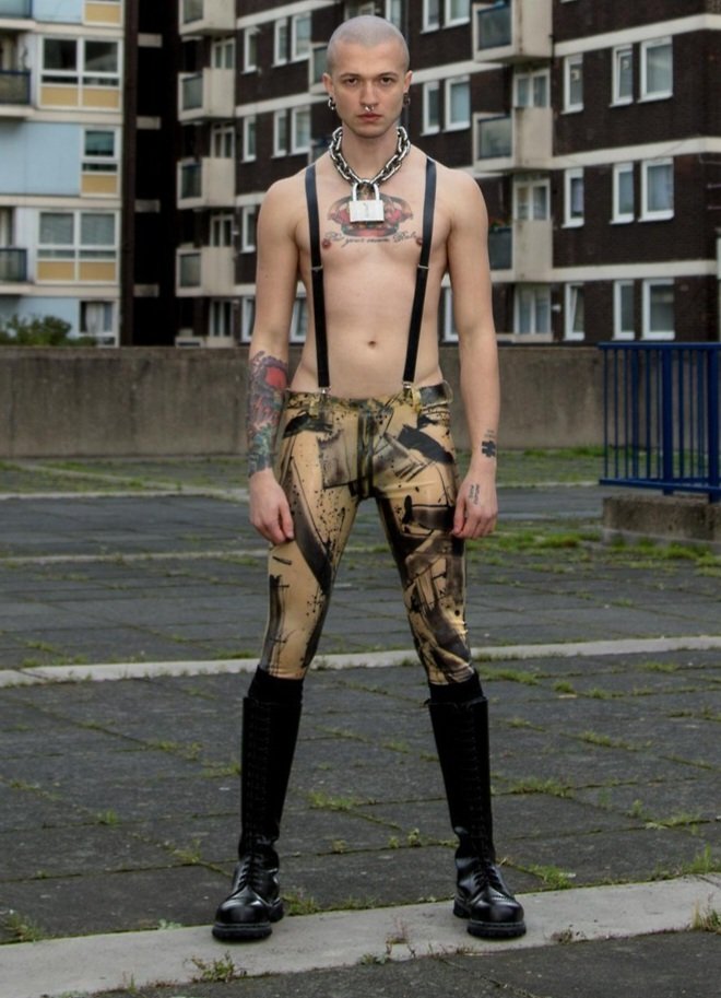 Gorgeous young Skin in rubber pants, boots &amp; nose septum.