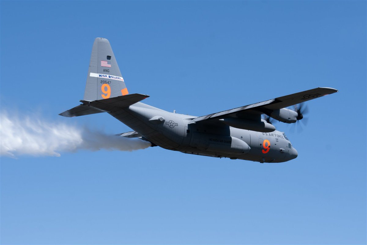 A C-130 (MAFFS 9) from Nevada Air National Guard's 152nd Airlift Wing performs a water drop May 8, 2024, during Modular Airborne Fire Fighting System (MAFFS) Spring Training 2024, hosted by the California Air National Guard's 146th Airlift Wing. #MAFFS #Wildfires