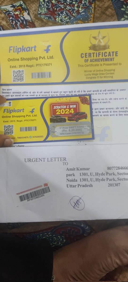 riarajput1994's tweet photo. @Flipkart @flipkartsupport 
I just received an envelope at my address with someone else 's name and number and the person is not even residing here. See what have I received in it. This seems a clear fraudulent activity. please take strict and appropriate action https://t.co/fukgzx7VHJ
