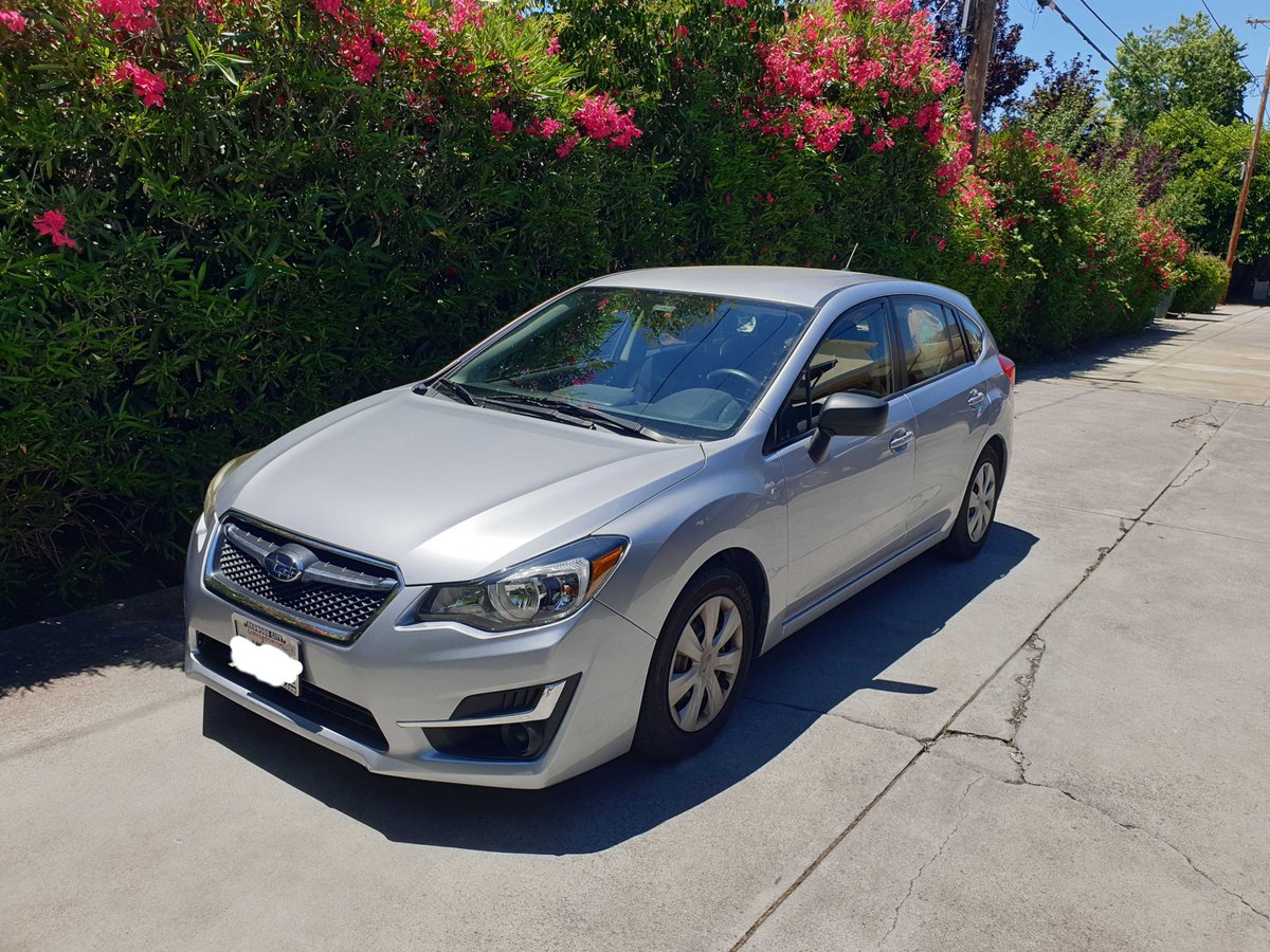 Michael_D_Moor's tweet photo. ✨Attention, #SiliconValley!✨

As my time at @Stanford approaches its end, I’m selling this factory-grade, car-sized car!🤯

Ready for a yourself-driving experience? Meet my 2015 Subaru Impreza (51k miles young👀). It features a limited-edition interface called a 'steering wheel' that seemlessly connects to your hands (dual-wield mode) for real-time, user-driven navigation! 

This manual car is so responsive, it feels like it’s reading your mind (but really, it’s just your hands on the wheel and the stick). 
No terms and conditions to scroll through. No black-box algorithms, just pure, unadulterated mechanical feedback. 

Say goodbye to software updates and hello to hardware that listens to you! Experience the thrill of making decisions at every single turn! This car is perfect for those who prefer to be in control rather than be controlled. 

Put the 'I' back in driving, and hit me with a DM!