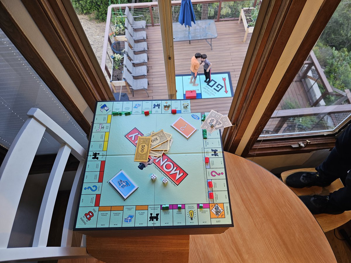 dcarta's tweet photo. Thomas and Adam decided to play Monopoly for their entry into the Forced Perspective Optical Illusion contest for the #campcrunchlabscontest - On the way they got to learn how to scale up a design from a corner of a gameboard all the way up to a 4x8 piece of plywood! https://t.co/SLso6z3Yvc