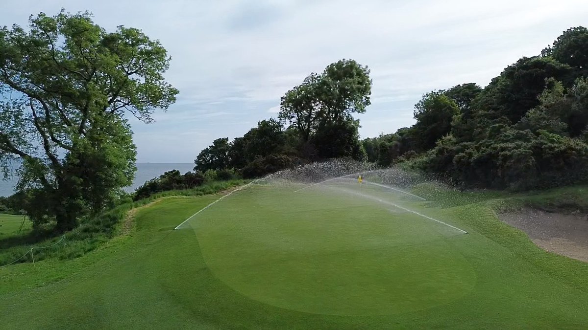 10th green complex being watered. #royalbelfast #oldestgolfclubinireland #royalroadtrip #belfastlough #golf #northernireland