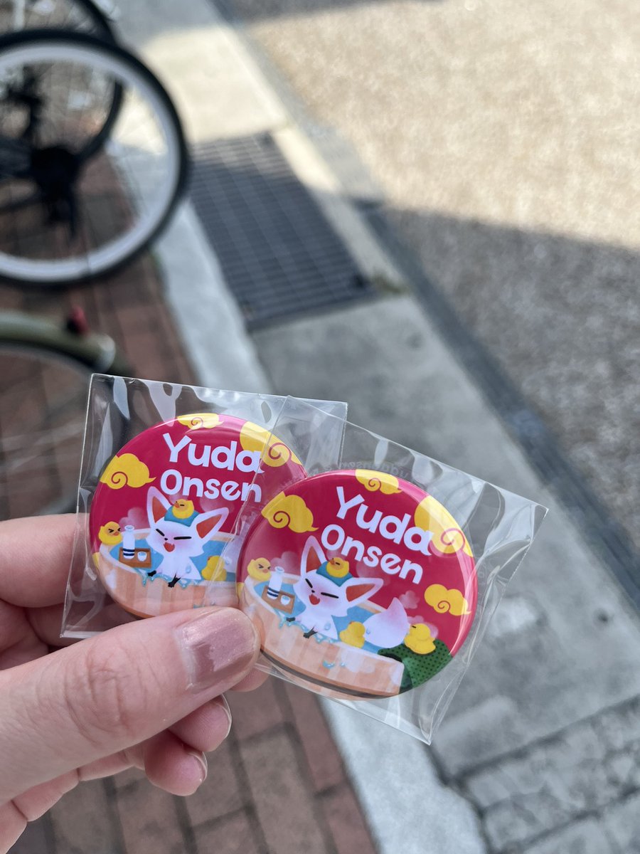 こぎつね缶バッジの「湯田温泉」の絵柄が6月よりリニューアルしており