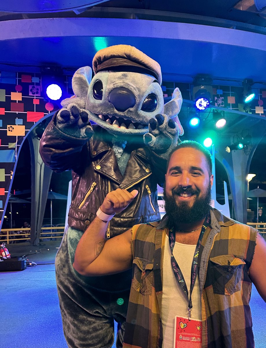 Me with leather daddy Stitch last night at Disney gay days.