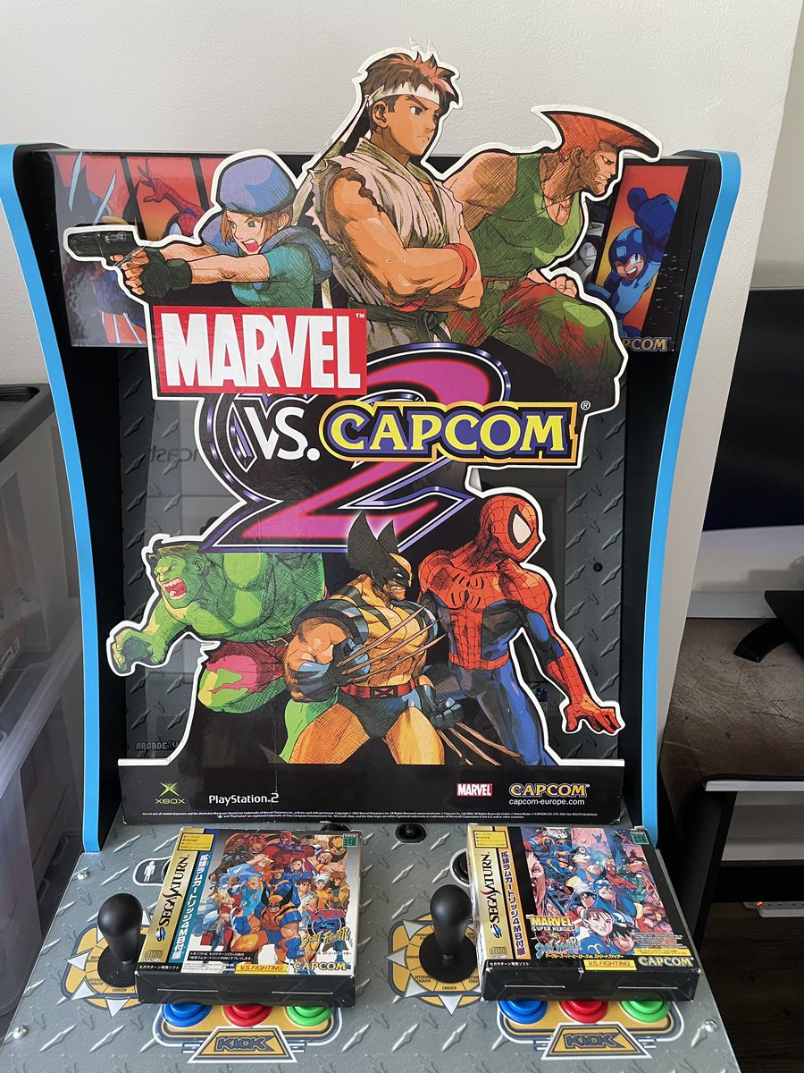 TheStreetWriter's tweet image. Still reeling from yesterday’s announcement! I’ve got this original Marvel vs. Capcom 2 shop standee at home and I’ve been counting down the days every time I see it 😁 #MVC2isFree