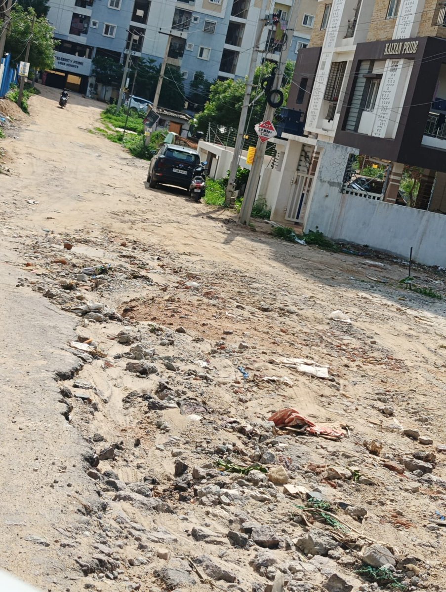 cvmouli's tweet photo. Plea to @commissionerghmc @gadwalvijayainc for laying approach  road to #UberHeights in KMR Estates,Kondapur. We are suffering with lack of proper approach road to our building. Please look for yourself the attached photos for your understanding how pathetic the road is!! https://t.co/V8cYBv9fXK