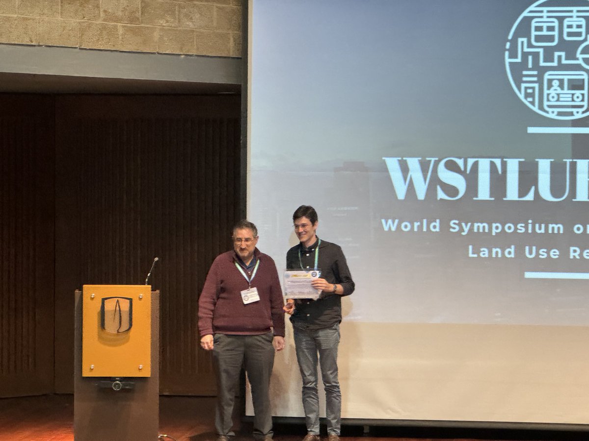 ⁦<a href="/UrbanDemog/">Rafael H. M. Pereira 🚡 Urban Demographics</a>⁩ receiving the David Levinson best paper award at the WSTLUR 2024 in Bogotá Colombia