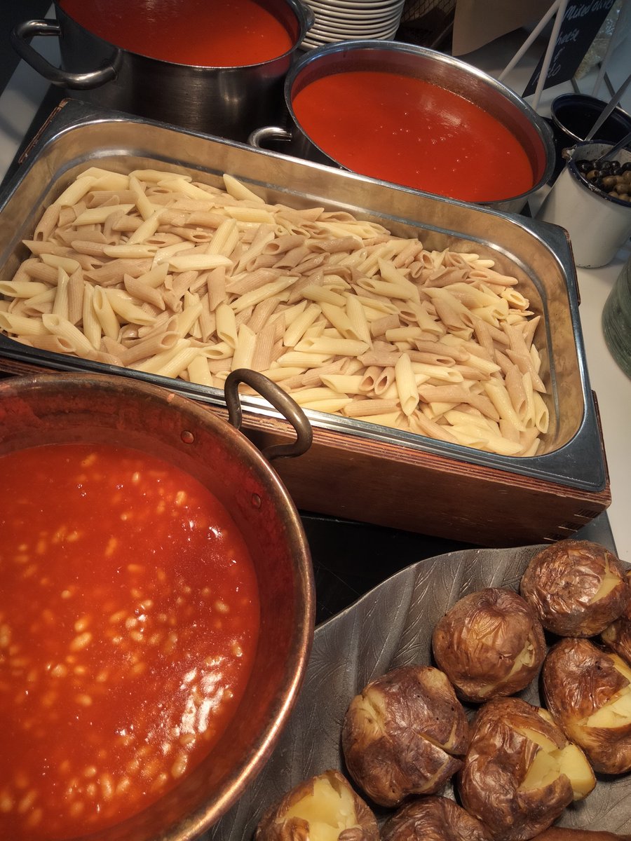 Wednesday lunch - pork and vegetable gyros, selection of salad fillings, khobez bread, skinny fries. Vegetarian choice - crispy halloumi gyros. Selection of salads. Jacket potatoes with baked beans. Pasta with tomato sauce