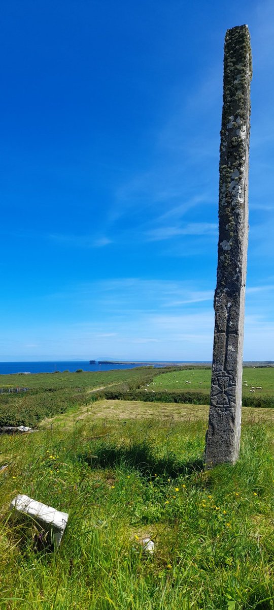 Please enjoy this rare (and meticulously timed archaeo shadowed) photo of Doonfeeney Standing Stone, Co. Mayo, bathed in sunshine against a mysteriously coloured sky that isn't grey.